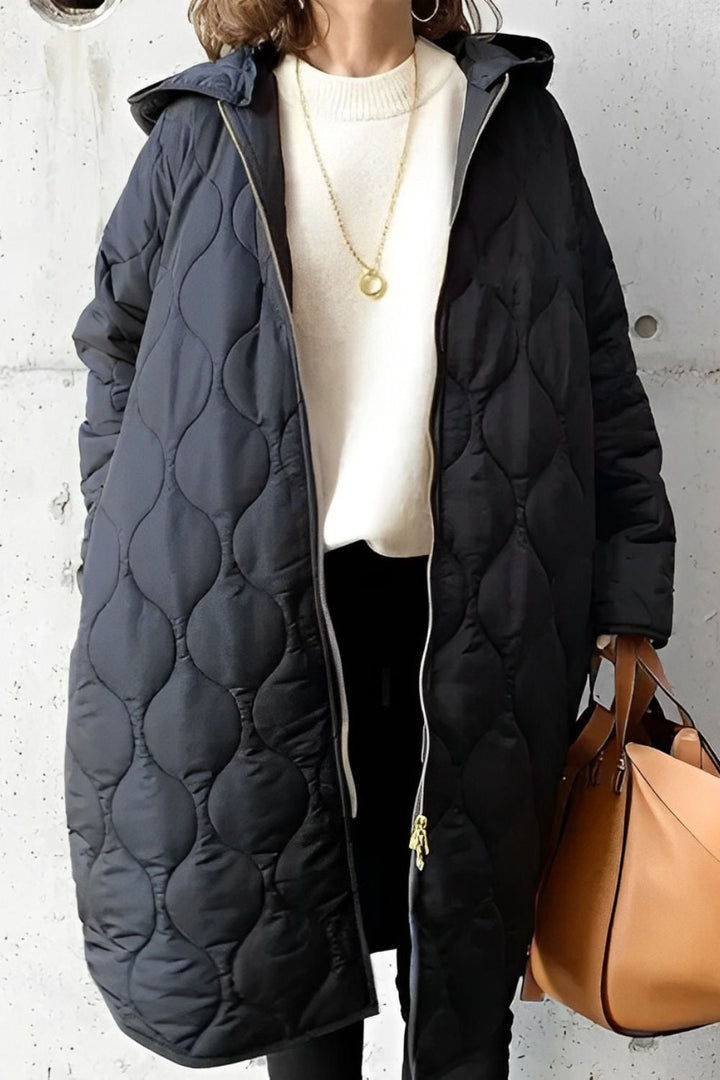 Saskia | Chaqueta con capucha y detalles refinados