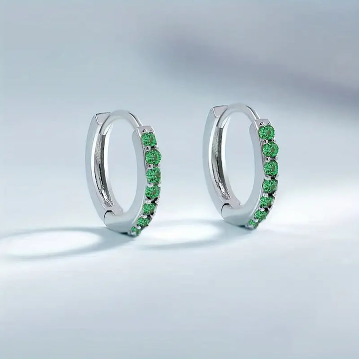 Pendientes colgantes de oro inspirados en la costa