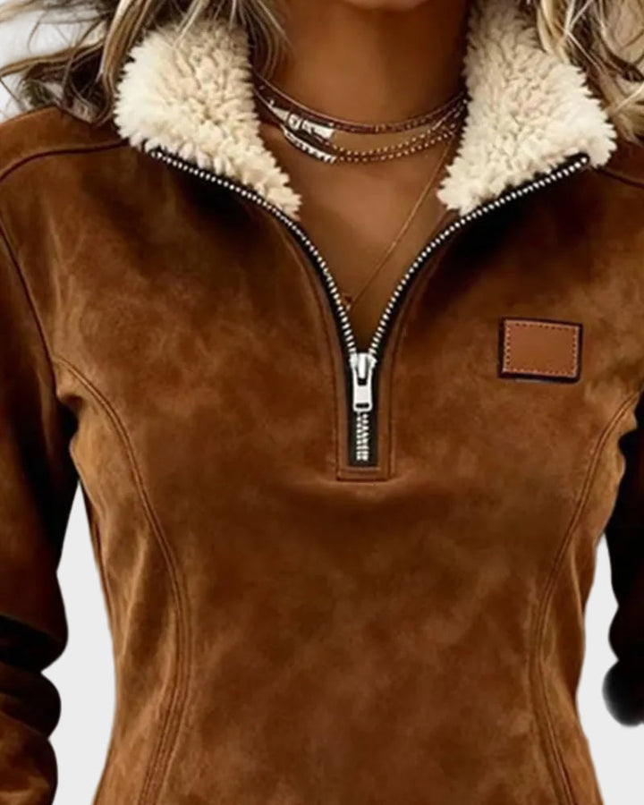 Petra – Sudadera elegante para mujer con piel y flecos