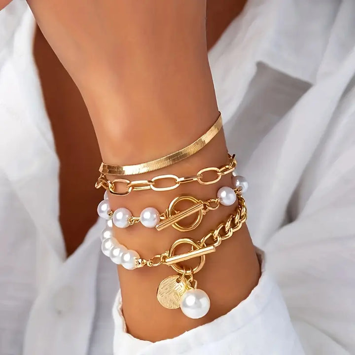 Conjunto de pulseras elegantes en oro (4 piezas) – serpiente, perlas y eslabones