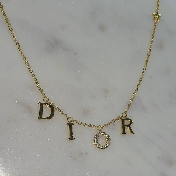 Collar DR en Oro