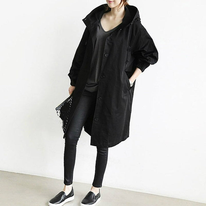 Abrigo trench elegante y repelente al agua