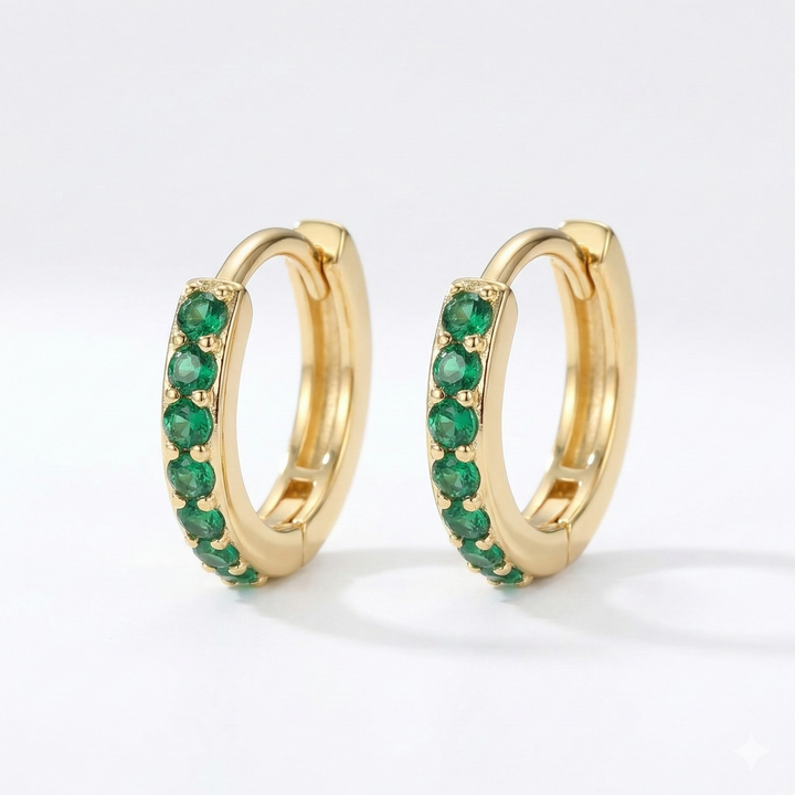 Pendientes colgantes de oro inspirados en la costa