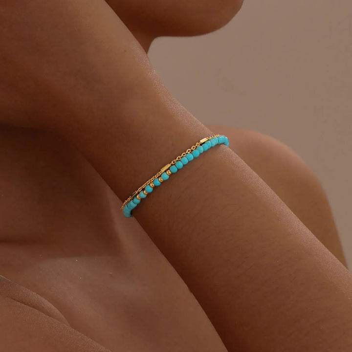 Pulsera doble en oro atemporal con turquesa