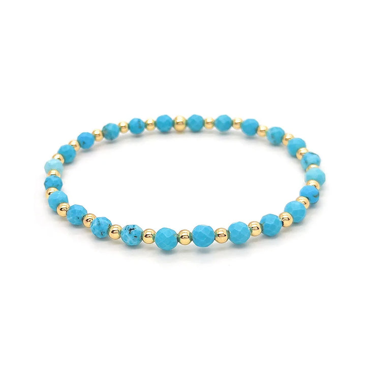 Pulsera de perlas de cruz vintage en turquesa