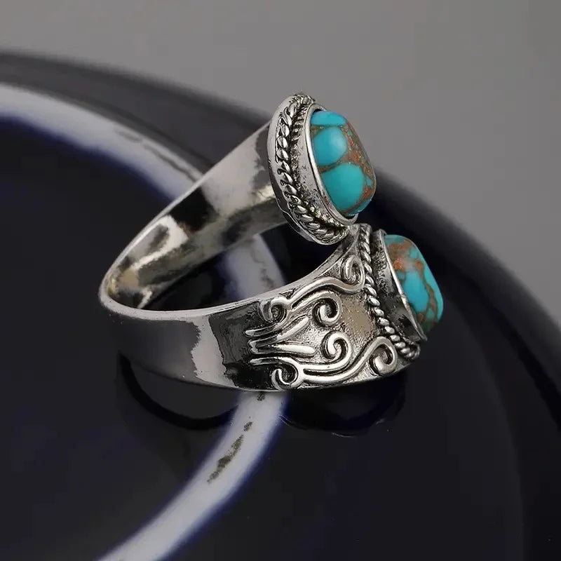 Anillo Cruzado Vintage Elegante en Turquesa