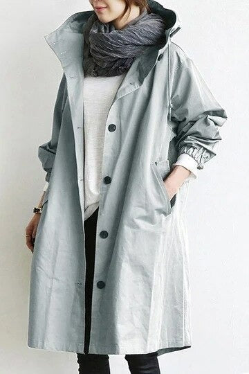 Abrigo trench elegante y repelente al agua