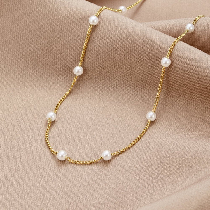 Collar de Perlas y Oro Intemporal